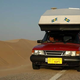 Illustration for article titled Crazy Swedes Drive Toppola-Equipped Saab 900 To Vietnam and Back